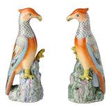 Pair of de Gournay famille rose porcelain parrot figurines on rockwork bases