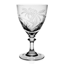 Clear Palmyra Goblet glass with intricate etching on a white background